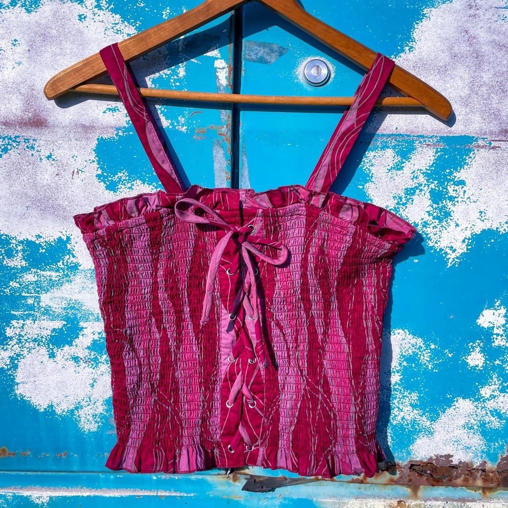 00's thread story cropped tank w/ smocked bodice & lace-up corset front.